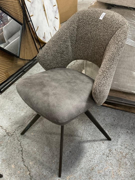 Lot 95  
            Marchington SR11 - Delivery or Collection 

                
OAK FURNITURELAND NICO SWIVEL DINING CHAIR IN DARK GREY WITH BLACK METAL LEGS ORI...