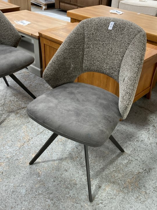 Lot 96  
            Marchington SR11 - Delivery or Collection 

                
OAK FURNITURELAND NICO SWIVEL DINING CHAIR IN DARK GREY WITH BLACK METAL LEGS ORI...