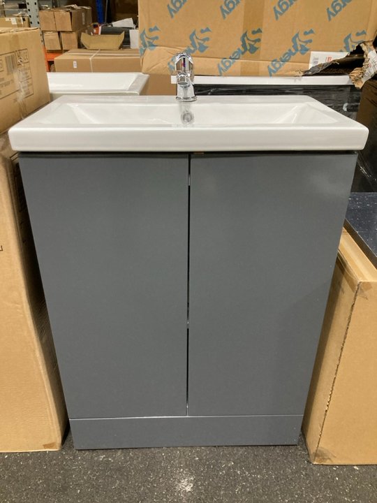Lot 105  
            Marchington SR19 - Delivery or Collection 

                
FLOOR STANDING 2 DOOR SINK UNIT IN GLOSS GREY WITH A 610 X 370MM 1TH CERAMIC BASI...
