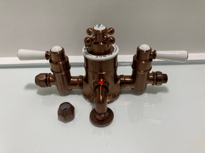 Lot 1088  
            Marchington SR19 - Delivery or Collection 

                
TRADITIONAL TRIPLE EXPOSED SHOWER VALVE IN COPPER - ORIGINAL RRP £515: LOCATION -...