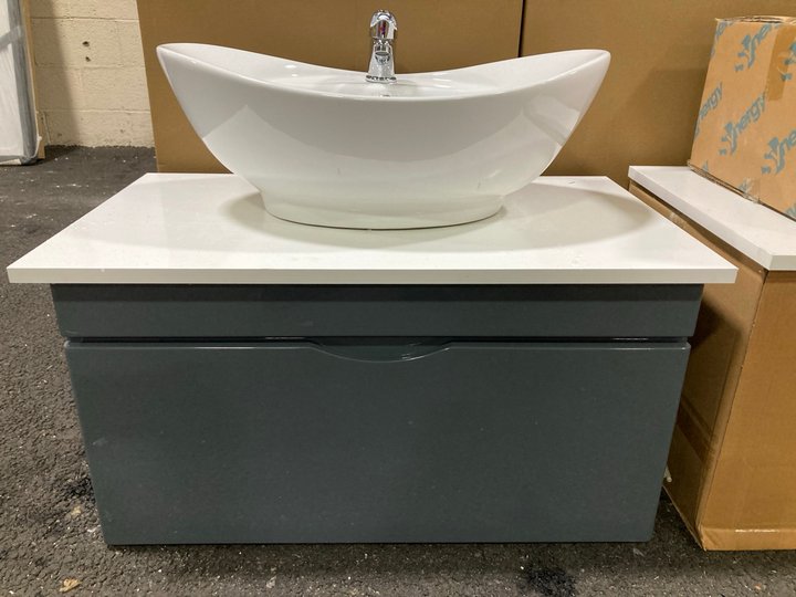 Lot 109  
            Marchington SR19 - Delivery or Collection 

                
WALL HUNG 1 DRAWER COUNTER TOP SINK UNIT IN GLOSS GREY & WHITE 800 X 460MM WITH A...