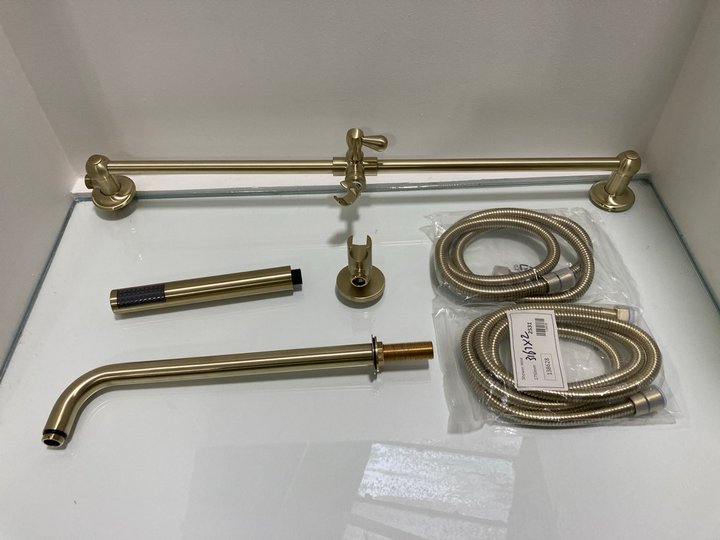 Lot 1102  
            Marchington SR19 - Delivery or Collection 

                
BRUSHED BRASS SHOWER RAIL FITTINGS WITH PENCIL STYLE HANDSET & HOSE: LOCATION - R...