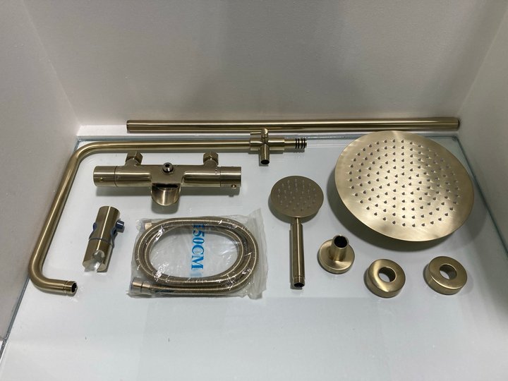Lot 1115  
            Marchington SR19 - Delivery or Collection 

                
WALL MOUNTED THERMOSTATIC BSM IN BRUSHED BRASS WITH RISER RAIL, ROUND FIXED SHOWE...
