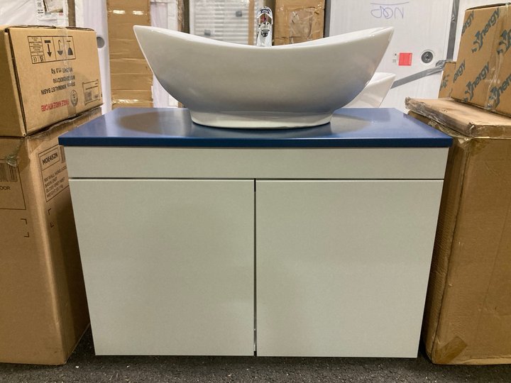 Lot 124  
            Marchington SR19 - Delivery or Collection 

                
WALL HUNG 2 DOOR COUNTER TOP SINK UNIT IN GLOSS GREY MIST & SATIN BLUE 805 X 390M...
