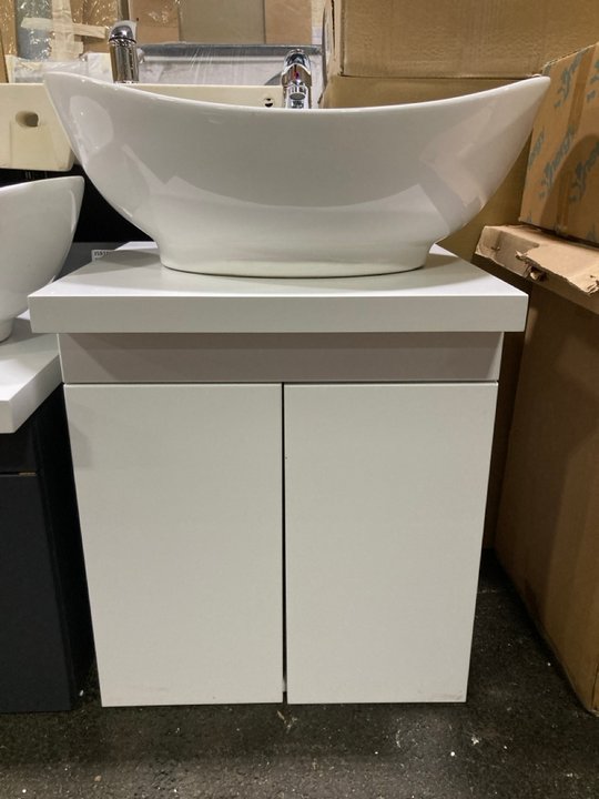 Lot 131  
            Marchington SR19 - Delivery or Collection 

                
WALL HUNG 2 DOOR COUNTER TOP SINK UNIT IN WHITE 500 X 460MM WITH A 1TH CERAMIC BA...
