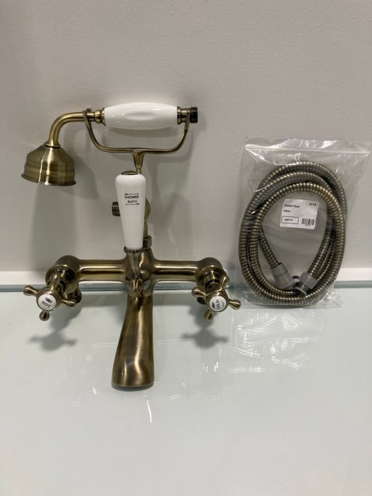 Lot 197  
            Marchington SR19 - Delivery or Collection 

                
TRADITIONAL BSM IN BRUSHED GOLD WITH SHOWER HANDSET & HOSE - ORIGINAL RRP £385: L...