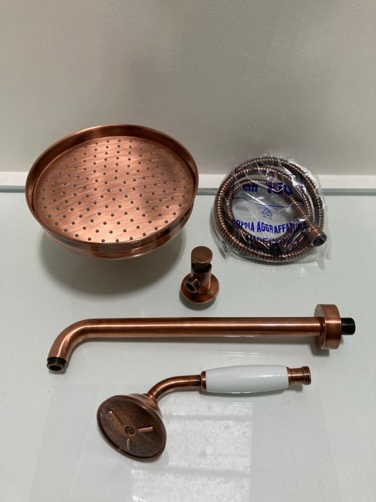 Lot 293  
            Marchington SR19 - Delivery or Collection 

                
TRADITIONAL ROSE SHOWER HEAD IN COPPER WITH WALL MOUNTED ARM WITH SHOWER HANDSET,...