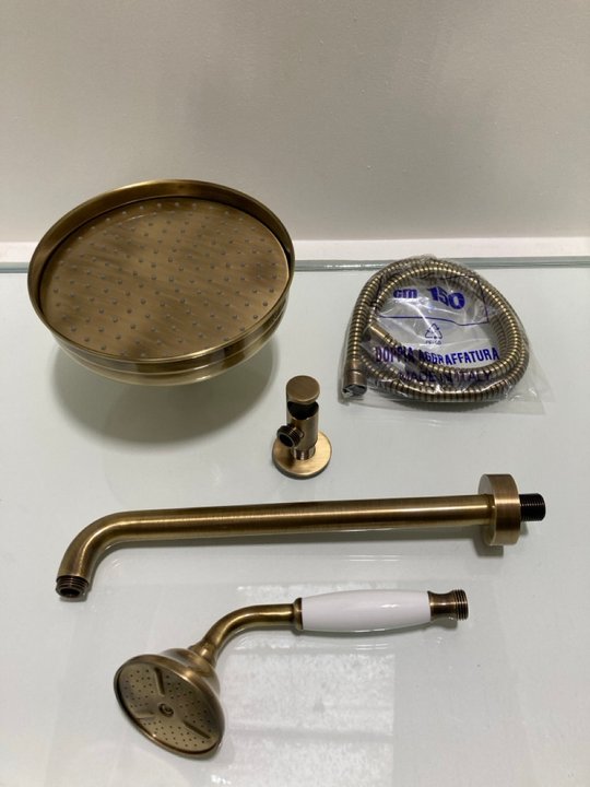 Lot 294  
            Marchington SR19 - Delivery or Collection 

                
TRADITIONAL ROSE SHOWER HEAD IN BRONZE WITH WALL MOUNTED ARM WITH SHOWER HANDSET,...
