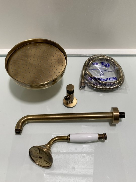 Lot 295  
            Marchington SR19 - Delivery or Collection 

                
TRADITIONAL ROSE SHOWER HEAD IN BRONZE WITH WALL MOUNTED ARM WITH SHOWER HANDSET,...