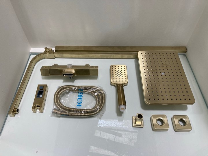 Lot 337  
            Marchington SR19 - Delivery or Collection 

                
WALL MOUNTED SQUARE STYLED THERMOSTATIC BSM IN BRUSHED BRASS WITH RISER RAIL, REC...