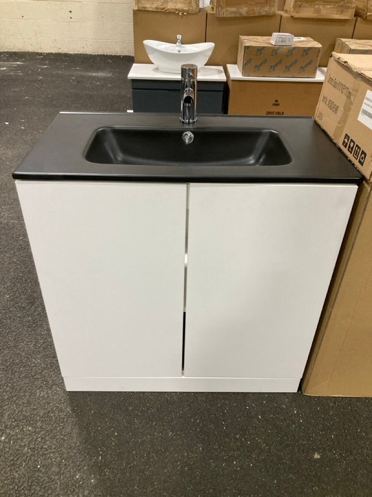 Lot 37  
            Marchington SR19 - Delivery or Collection 

                
FLOOR STANDING 2 DOOR SINK UNIT IN WHITE WITH A 810 X 460MM 1TH BLACK CERAMIC BAS...
