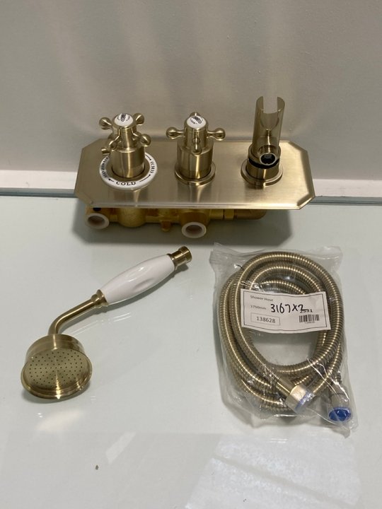 Lot 518  
            Marchington SR19 - Delivery or Collection 

                
TRADITIONAL TWIN CONCEALED SHOWER VALVE IN BRUSHED BRASS WITH OUTLET ELBOW/PARKIN...