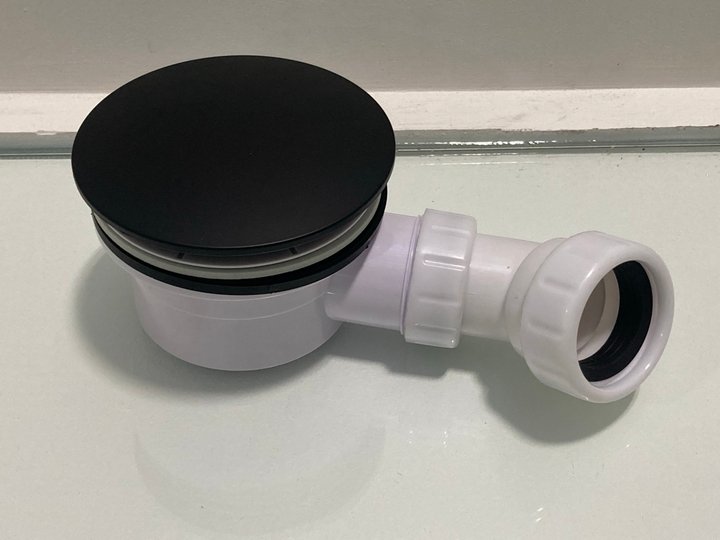 Lot 535  
            Marchington SR19 - Delivery or Collection 

                
90MM FAST FLOW SHOWER WASTE IN BLACK WITH OUTLET ELBOW - ORIGINAL RRP £95: LOCATI...