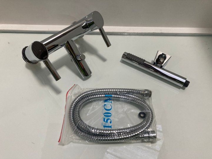 Lot 541  
            Marchington SR19 - Delivery or Collection 

                
DECK MOUNTED BSM IN CHROME WITH PENCIL STYLE HANDSET, HOSE & WALL MOUNTING BRACKE...