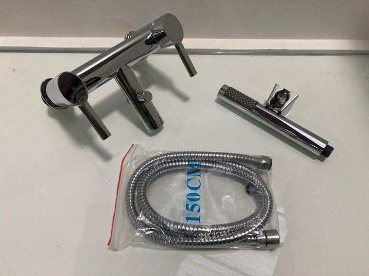 Lot 542  
            Marchington SR19 - Delivery or Collection 

                
DECK MOUNTED BSM IN CHROME WITH PENCIL STYLE HANDSET, HOSE & WALL MOUNTING BRACKE...