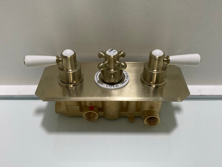 Lot 610  
            Marchington SR19 - Delivery or Collection 

                
TRADITIONAL CONCEALED TRIPLE SHOWER VALVE IN BRUSHED BRASS - ORIGINAL RRP £525: L...