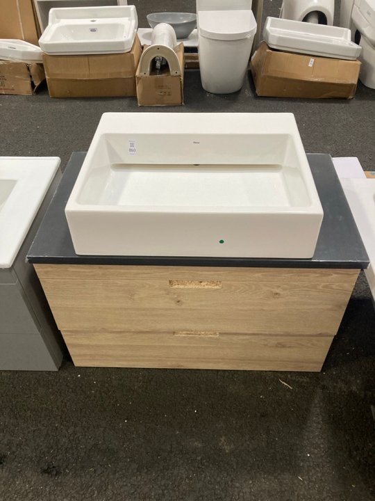 Lot 860  
            Marchington SR19 - Collection 

                
(COLLECTION ONLY) WALL HUNG 2 DRAWER COUNTER TOP SINK UNIT IN OAK & ANTHRACITE 81...