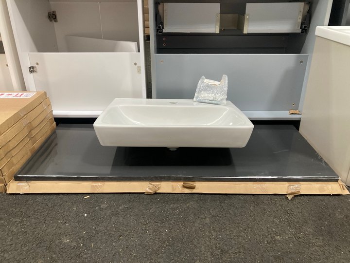 Lot 872  
            Marchington SR19 - Collection 

                
(COLLECTION ONLY) GLOSS ANTHRACITE 1210 X 465MM COUNTER TOP COMPLETE WITH A VITRA...