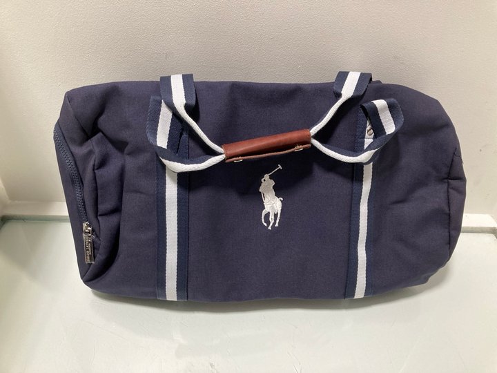 Lot 1114  
            Marchington SR13 - Parcel Delivery Only 

                
RALPH LAUREN POLO DUFFLE WEEKENDER BAG IN BLUE: LOCATION - B17