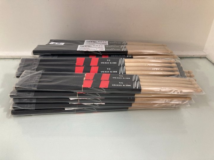 Lot 1188  
            Marchington SR13 - Parcel Delivery Only 

                
QTY OF SETS OF 2 WOODEN DRUMSTICKS: LOCATION - D2