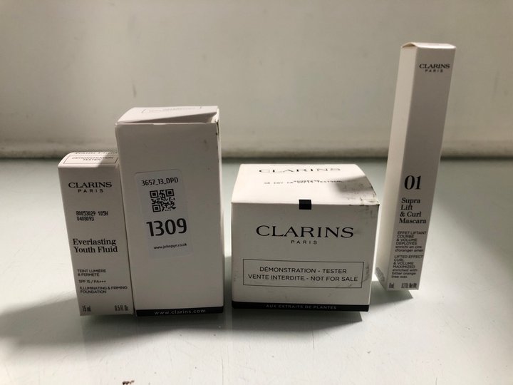 Lot 1309  
            Marchington SR13 - Parcel Delivery Only 

                
4 X ASSORTED CLARINS DEMONSTRATION TESTER BEAUTY ITEMS TO INCLUDE 8ML 01 SUPRA LI...