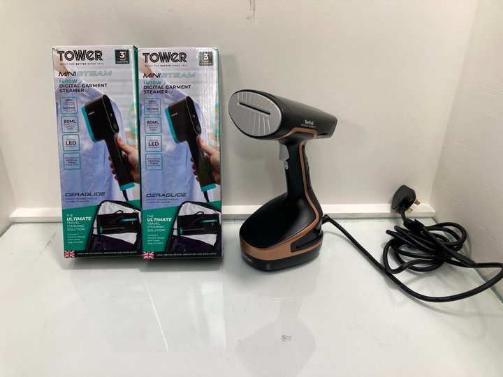 Lot 140  
            Marchington SR13 - Parcel Delivery Only 

                
2 X TOWER MINI STEAM DIGITAL GARMENT STEAMERS TO INCLUDE TEFAL ACCESS STEAM+ GARM...
