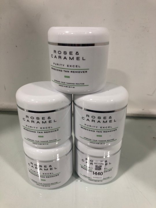 Lot 1440  
            Marchington SR13 - Parcel Delivery Only 

                
5 X ROSE & CARAMEL 440ML PURITY EXCEL 60 SECOND TAN REMOVER - COMBINED ORIGINAL R...