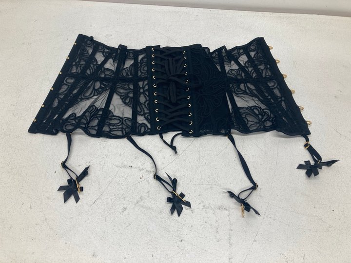 Lot 1506  
            Marchington SR13 - Parcel Delivery Only 

                
AGENT PROVOCATEUR NELLE WASPIE IN BLACK-SIZE 2-ORIGINAL RRP £495.00: LOCATION - WA1