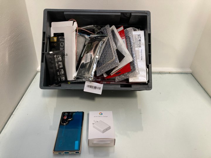 Lot 174  
            Marchington SR13 - Parcel Delivery Only 

                
QTY OF ASSORTED TECH ITEMS TO INCLUDE STAND XT-09 MOBILE PHONE HOLDER: LOCATION -...