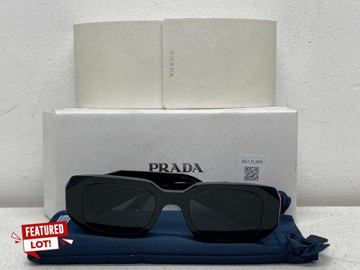 Lot 17  
            Marchington SR13 - Parcel Delivery Only 

                
PRADA SYMBOLE PR17WS 1AB5SO SUNGLASSES WITH BLACK ACETATE FRAME AND DARK GREY LEN...