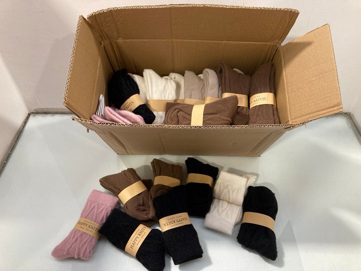 Lot 245  
            Marchington SR13 - Parcel Delivery Only 

                
QTY OF HAPPY KNITS WOOL SOCKS IN VARIOUS COLORS - SIZE UNKNOWN: LOCATION - C12