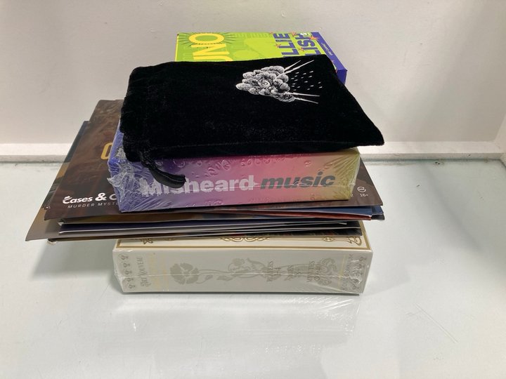 Lot 331  
            Marchington SR13 - Parcel Delivery Only 

                
QTY OF ASSORTED ADULT GAMES TO INCLUDE UNO BILLIE EILISH UNO CANVAS CARD GAME: LO...