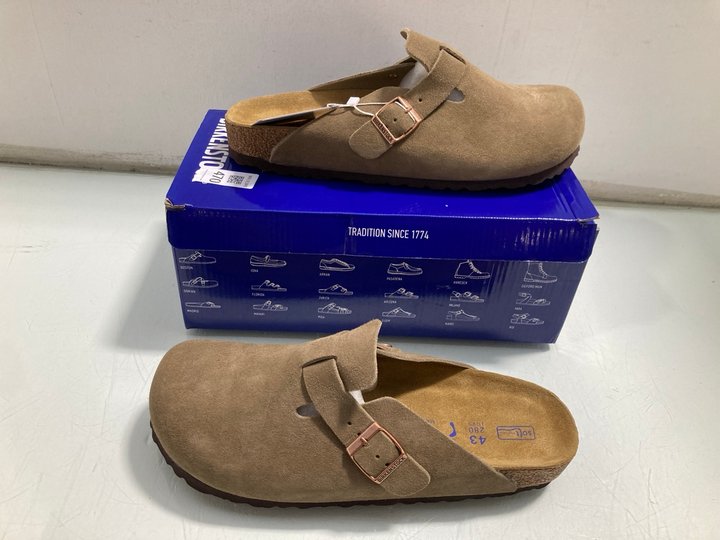 Lot 470  
            Marchington SR13 - Parcel Delivery Only 

                
BIRKENSTOCK BOSTON SANDALS IN TAUPE - SIZE UK 12 - ORIGINAL RRP £150: LOCATION - C2