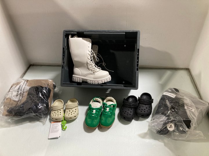 Lot 517  
            Marchington SR13 - Parcel Delivery Only 

                
6 X ASSORTED KIDS SHOES IN VARIOUS SIZES TO INCLUDE CROCS IVORY BABY CLOGS - UK S...