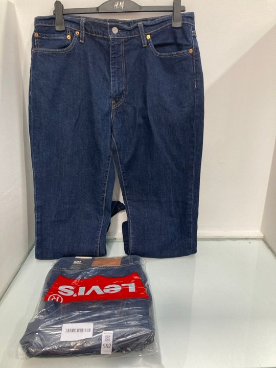 Lot 592  
            Marchington SR13 - Parcel Delivery Only 

                
2 X LEVI'S ASSORTED JEANS - UK SIZES: 38 x 34 / 36 x 30 - COMBINED ORIGINAL RRP: ...