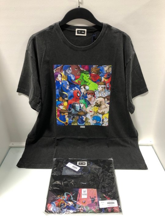 Lot 698  
            Marchington SR13 - Parcel Delivery Only 

                
KITH MVC HERCULES VS STREETFIGHTER VINTAGE TEE IN BLACK TO INCLUDE KITH MVC CLASH...