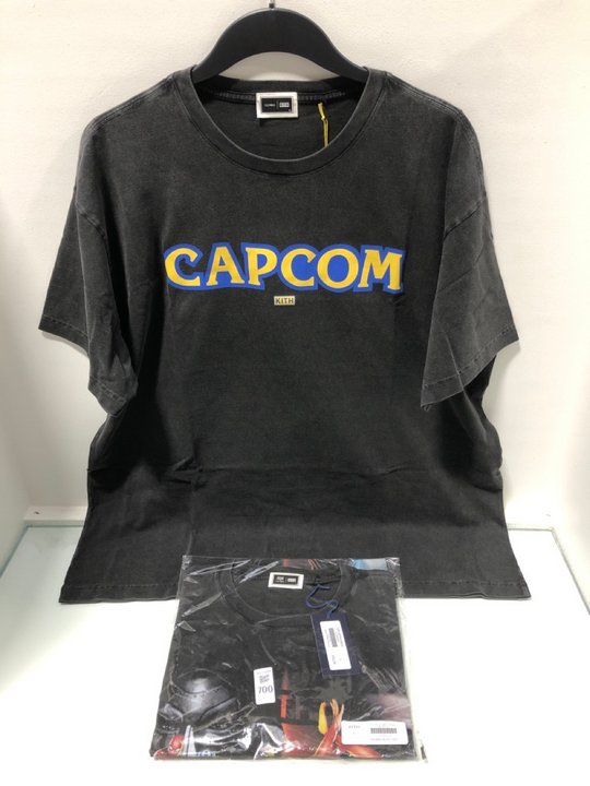 Lot 700  
            Marchington SR13 - Parcel Delivery Only 

                
KITH MVC ULTIMATE VINTAGE TEE IN BLACK TO INCLUDE KITH CAPCOM VINTAGE JONES TEE I...