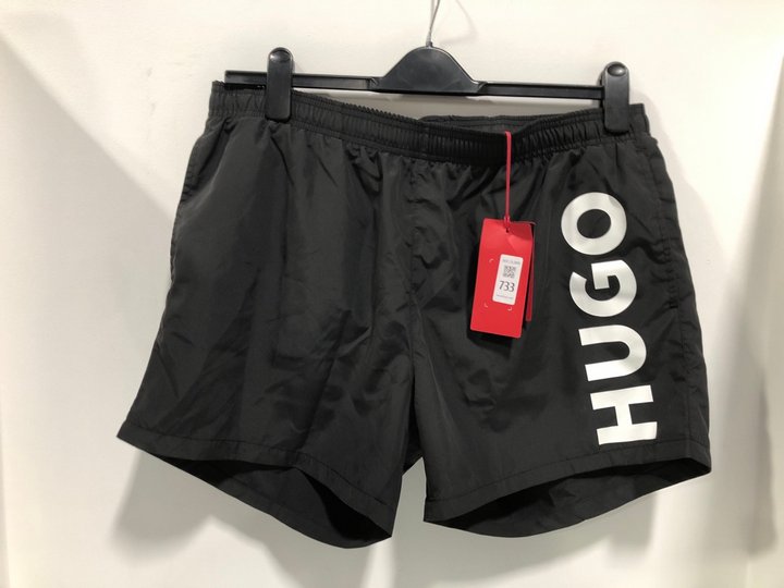 Lot 733  
            Marchington SR13 - Parcel Delivery Only 

                
HUGO BOSS MENS ABAS SWIM SHORTS IN BLACK - SIZE UK 2XL: LOCATION - B13