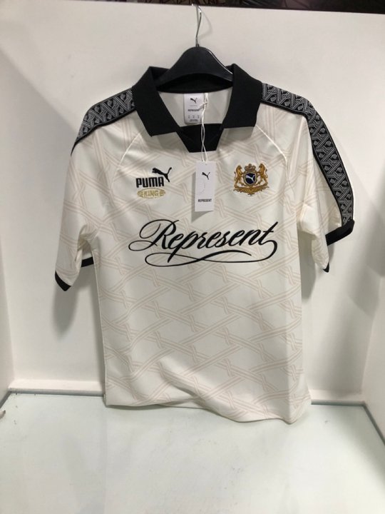 Lot 735  
            Marchington SR13 - Parcel Delivery Only 

                
PUMA X REPRESENT MENS KING JERSEY TOP IN BLACK/WHITE - SIZE UK XS TO INCLUDE PUMA...