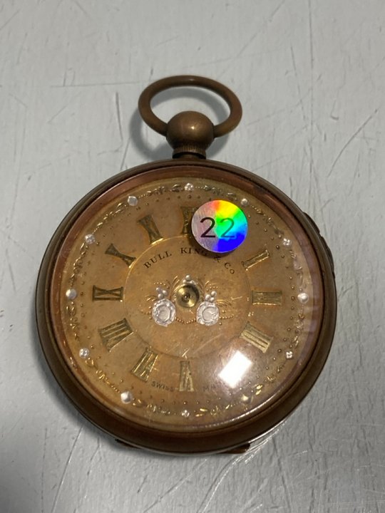 Lot 861  
            Marchington SR13 - Parcel Delivery Only 

                
BULL KING &CO ANTIQUE KEY WOUND BRASS CASED POCKET WATCH (MISSING HANDS): LOCATIO...