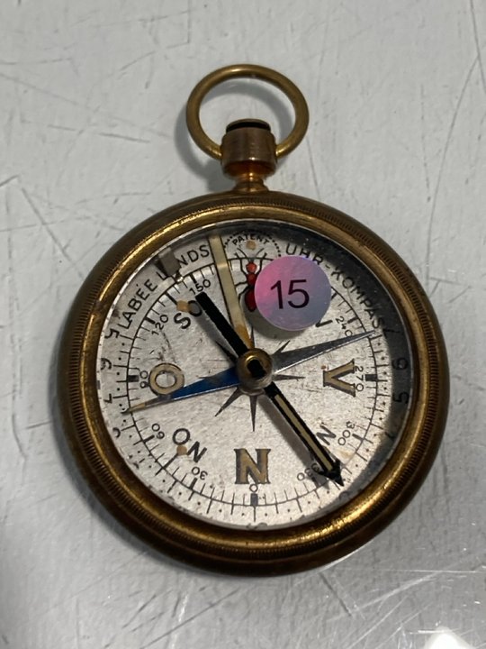 Lot 863  
            Marchington SR13 - Parcel Delivery Only 

                
ANTIQUE L'ABBE LUND WATCH COMPASS C.1920S, 52MM DIMETER, BRASS CASE, SILVERED FAC...