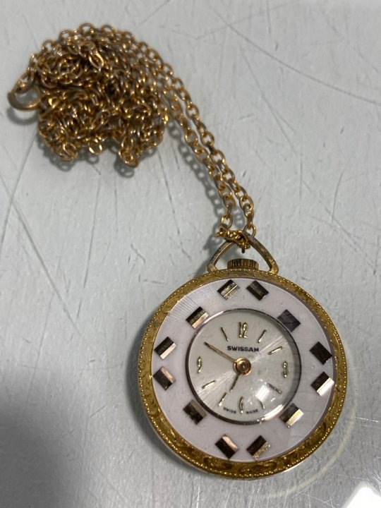 Lot 867  
            Marchington SR13 - Parcel Delivery Only 

                
VINTAGE SWISSAM MECHANICAL MOVEMENT PENDANT WATCH AND CHAIN, BOXED: LOCATION - D3