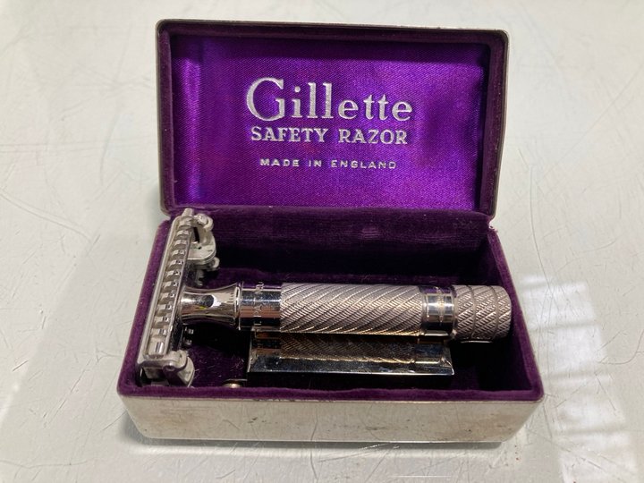 Lot 876  
            Marchington SR13 - Parcel Delivery Only 

                
ANTIQUE GILETTE SAFETY RAZOR IN ORIGINAL LINED STAINLESS STEEL CASE (18+ ID REQUI...