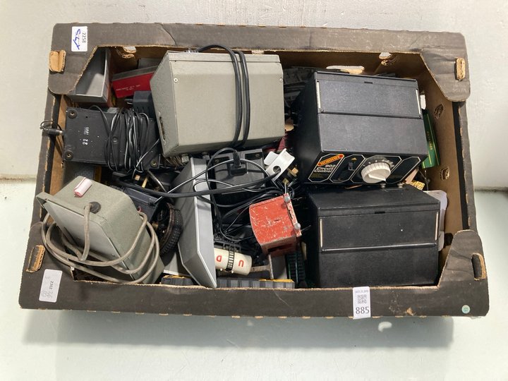 Lot 885  
            Marchington SR13 - Parcel Delivery Only 

                
A BOX OF VINTAGE MODEL RAILWAY EQUIPMENT TO INCLUDE TRANSFORMERS: LOCATION - D3