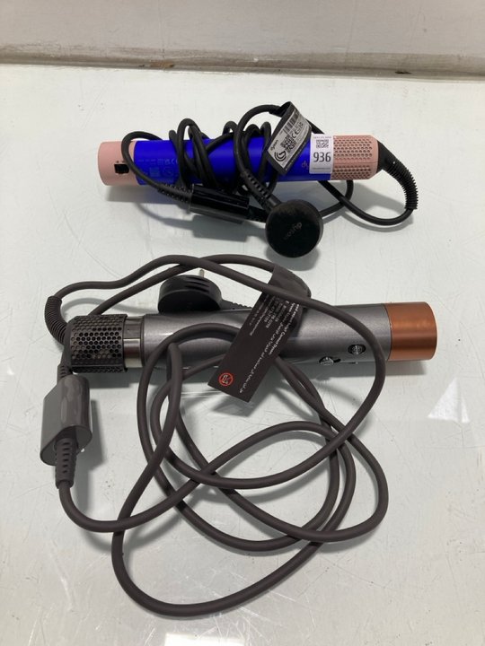 Lot 936  
            Marchington SR13 - Parcel Delivery Only 

                
2 X DYSON AIR WRAP MULTI STYLERS -ORIGINAL COMBINED RRP £600.00: LOCATION - D6