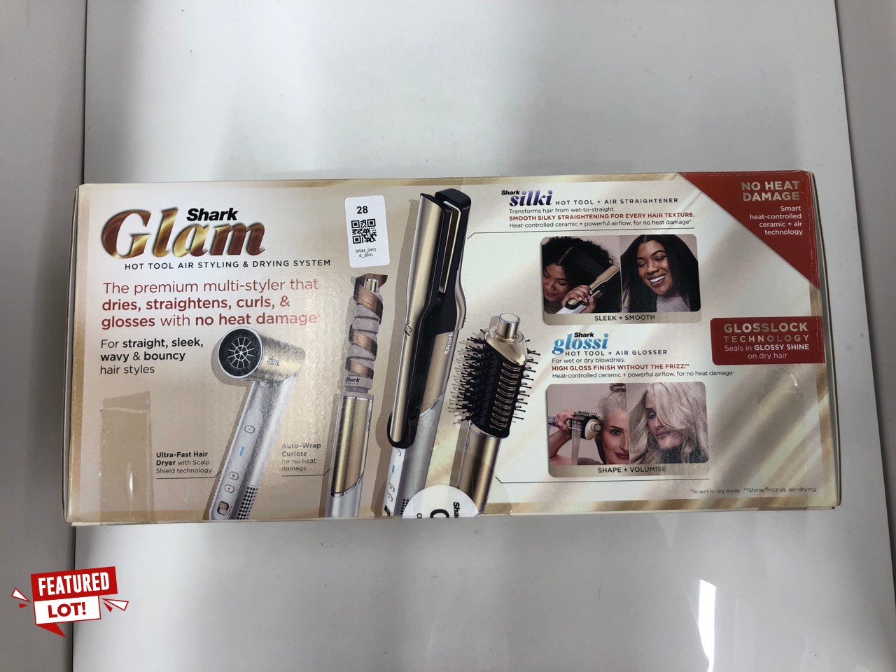 Lot 28  
            Edinburgh SR34 - Delivery Only 

                
SHARK GLAM SLEEK STRAIGHT WAVES & CURLS MULTI-STYLER HD6051SUK. ORIGINAL RRP £370...