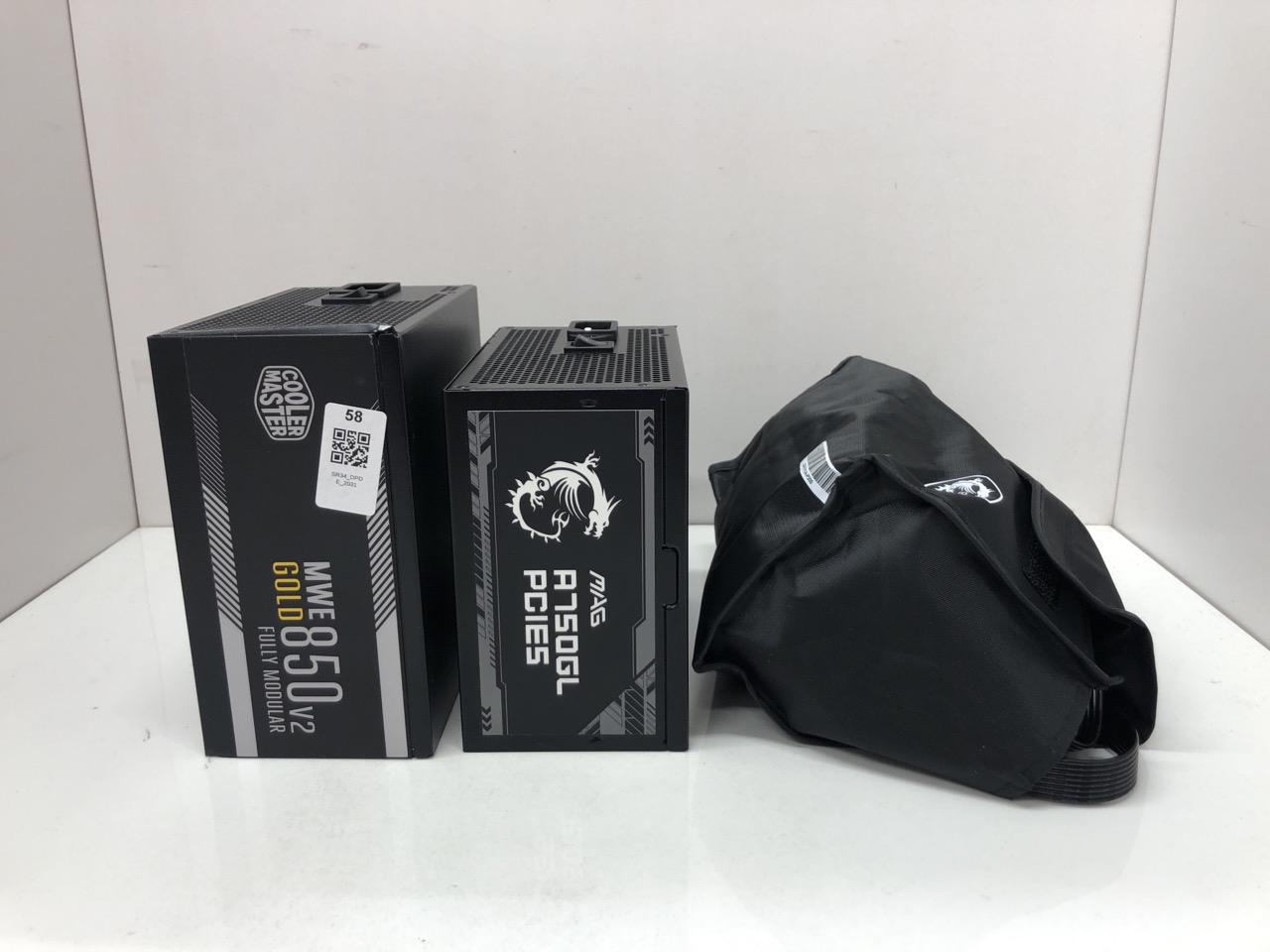 Lot 58  
            Edinburgh SR34 - Delivery Only 

                
COOLER MASTER MWE GOLD 850V2 FULLY MODULAR POWER SUPPLY + MSI MAG A750GL PCIES PO...