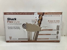 Lot 579  
            Edinburgh SR24 - Delivery Only 

                
SHARK FLEXSTYLE 4-IN-1 AIR STYLER & HAIR DRYER WITH AUTO-WRAP CURLERS, PADDLE BRU...