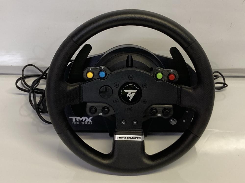 Lot 110  
            Birmingham Premium - Parcel Delivery Only 

                
THRUSTMASTER TMX PRO RACING WHEEL (ORIGINAL RRP - £236.92). (BOXED, POWER CABLE) ...