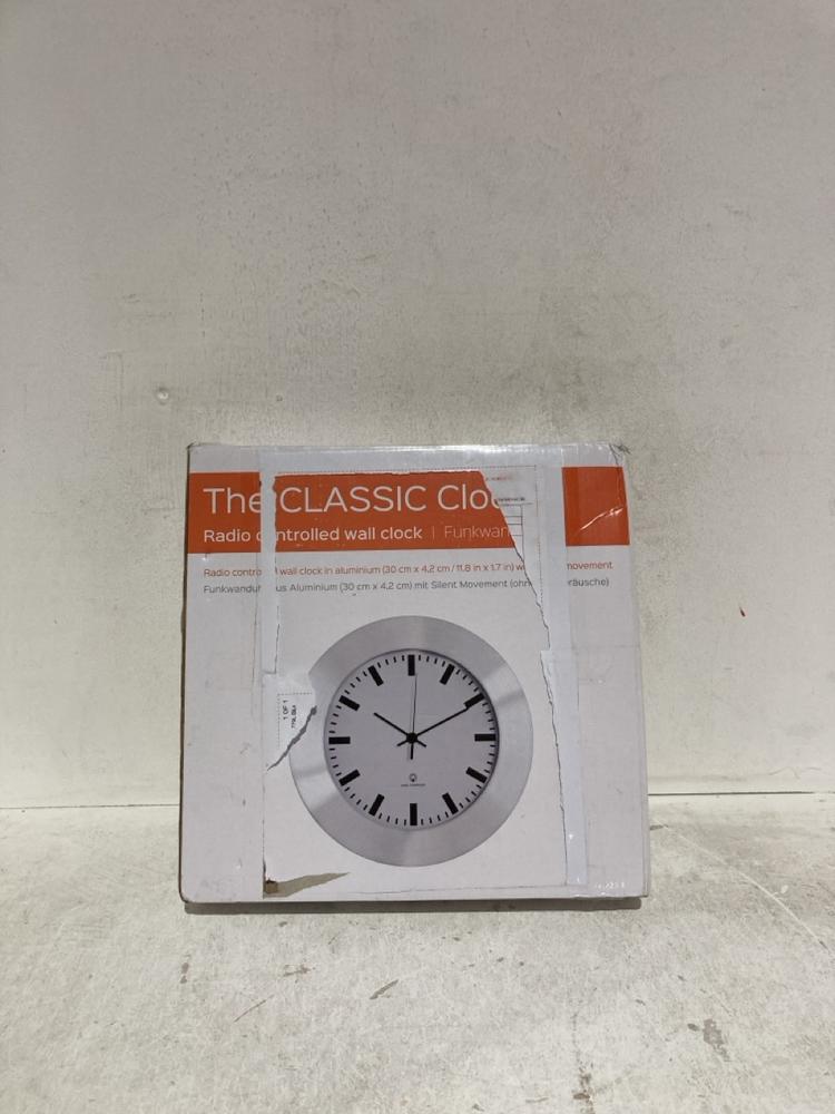 Lot 1063  
            Birmingham SR107 - Parcel Delivery Only 

                
RADIO CONTROLLED WALL CLOCK